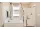 Relaxing main bathroom with soaking tub and separate glass shower at 7424 Rainford St, Las Vegas, NV 89148