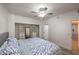 Spacious bedroom features updated closet space, wood floors and ample natural light at 75 N Valle Verde Dr # 211, Henderson, NV 89074