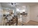 This dining room is bright with a large mirror and is adjacent to the kitchen at 75 N Valle Verde Dr # 211, Henderson, NV 89074