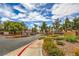 Well-maintained community entrance featuring colorful landscaping, a welcoming sight at 75 N Valle Verde Dr # 211, Henderson, NV 89074