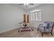 Office space with a chair and a decorative rug beneath a wooden desk at 75 N Valle Verde Dr # 211, Henderson, NV 89074