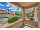 Open patio with view of the community parking area at 75 N Valle Verde Dr # 211, Henderson, NV 89074