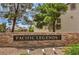 Welcome to Pacific Legends, as shown on this stone sign and landscaped entryway at 75 N Valle Verde Dr # 211, Henderson, NV 89074
