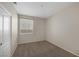 Neutral-toned bedroom with ample space, a closet, and bright natural light creates a cozy and inviting atmosphere at 7544 Coral River Dr, Las Vegas, NV 89131