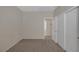 Neutral-toned bedroom with ample space, a closet, and bright natural light creates a cozy and inviting atmosphere at 7544 Coral River Dr, Las Vegas, NV 89131