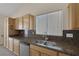 Kitchen featuring granite countertops, stainless steel appliances, and ample cabinet space at 7544 Coral River Dr, Las Vegas, NV 89131