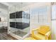Bathroom features a glass enclosed shower with stone floor at 7925 Limbwood Ct, Las Vegas, NV 89131
