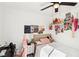 A playful bedroom featuring a single bed, bright decor, and a cozy workspace at 7925 Limbwood Ct, Las Vegas, NV 89131