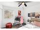 Bright bedroom featuring a comfortable bed, workspace, and modern decor at 7925 Limbwood Ct, Las Vegas, NV 89131
