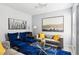 Well-decorated living room with a blue rug, and complementary furniture at 7925 Limbwood Ct, Las Vegas, NV 89131