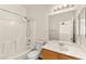 Bathroom with shower-tub combination, single sink vanity and bright lighting at 8113 Danaides Ct, Las Vegas, NV 89131