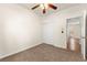 This bedroom features neutral carpet and a closet with sliding doors at 8113 Danaides Ct, Las Vegas, NV 89131