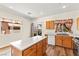Charming kitchen with island, wooden cabinets, and bright natural light at 8113 Danaides Ct, Las Vegas, NV 89131