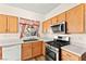 Bright kitchen featuring gas range, white countertops and ample cabinet space at 8113 Danaides Ct, Las Vegas, NV 89131