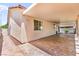 The backyard patio features a large covered area and hardscape at 8113 Danaides Ct, Las Vegas, NV 89131