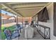 Spacious covered back patio is perfect for outdoor entertaining and dining at 823 Spikenard Dr, Henderson, NV 89002