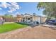 Spacious backyard featuring an open patio and grass area for outdoor enjoyment at 823 Spikenard Dr, Henderson, NV 89002