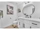 Bathroom with modern vanity, updated fixtures, and neutral decor at 823 Spikenard Dr, Henderson, NV 89002