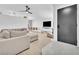Inviting living room featuring wood-look flooring and neutral décor at 823 Spikenard Dr, Henderson, NV 89002