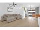 Bright living room features modern lighting, neutral tones, and an open floor plan at 823 Spikenard Dr, Henderson, NV 89002