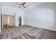 Spacious bedroom featuring plush carpeting, vaulted ceilings, and ample natural light at 8309 Windrush Ave, Las Vegas, NV 89117