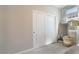 Bedroom featuring closet, mirror, lamp, and window with light filtering curtains at 8351 Vinamala Ave, Las Vegas, NV 89149