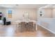 Bright dining room with a minimalist aesthetic and recessed lighting at 8351 Vinamala Ave, Las Vegas, NV 89149