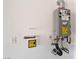 Tankless water heater with easy access for maintenance and repairs in this home at 8351 Vinamala Ave, Las Vegas, NV 89149