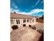 Beautiful backyard featuring a patio area, gravel landscaping and lush greenery at 8616 Willow Cabin St, Las Vegas, NV 89131