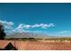 Backyard view showcasing desert landscape and scenic mountain views at 8616 Willow Cabin St, Las Vegas, NV 89131