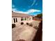 Backyard featuring patio, gravel accents, and lush greenery at 8616 Willow Cabin St, Las Vegas, NV 89131