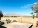 Backyard featuring a brick wall and a panoramic mountain view at 8616 Willow Cabin St, Las Vegas, NV 89131