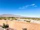 Scenic view of mountains and desert from backyard beyond the block fence at 8616 Willow Cabin St, Las Vegas, NV 89131