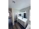 Bathroom featuring a toilet room and long vanity at 8616 Willow Cabin St, Las Vegas, NV 89131