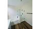 Modern bathroom featuring separate tub and shower at 8616 Willow Cabin St, Las Vegas, NV 89131