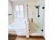 Bright bathroom with a soaking tub and glass-enclosed shower at 8616 Willow Cabin St, Las Vegas, NV 89131