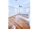 Bright bedroom featuring plantation shutters, recessed lighting, and wood-look flooring at 8616 Willow Cabin St, Las Vegas, NV 89131