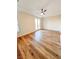 Bright bedroom featuring a ceiling fan, and french doors leading outside at 8616 Willow Cabin St, Las Vegas, NV 89131