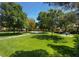 A lush green park with picnic tables and walking paths, enhancing the community's appeal at 8616 Willow Cabin St, Las Vegas, NV 89131