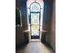 Exterior view of a private courtyard with a decorative iron gate at 8616 Willow Cabin St, Las Vegas, NV 89131