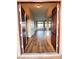 Inviting entryway featuring a double-door entry and bright, airy living space at 8616 Willow Cabin St, Las Vegas, NV 89131