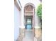 Elegant entryway with wrought iron security gate that leads into the open living space at 8616 Willow Cabin St, Las Vegas, NV 89131