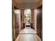 Double entry doors reveal an arched gate, offering a unique blend of style and security at 8616 Willow Cabin St, Las Vegas, NV 89131