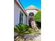 Inviting front entrance with stone accents and decorative security door at 8616 Willow Cabin St, Las Vegas, NV 89131