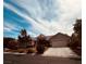 Attractive single-Gathering house with mature trees, a two-car garage, and a neatly maintained front yard at 8616 Willow Cabin St, Las Vegas, NV 89131