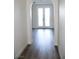 Bright hallway features hard surface floors and an arched doorway at 8616 Willow Cabin St, Las Vegas, NV 89131