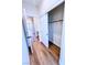 Hallway featuring a closet and beautiful wood-look flooring at 8616 Willow Cabin St, Las Vegas, NV 89131