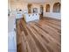 Spacious kitchen with white cabinets, stainless steel appliances, a kitchen island and recessed lighting at 8616 Willow Cabin St, Las Vegas, NV 89131