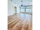Spacious living room featuring wood floors, high ceilings, and natural light at 8616 Willow Cabin St, Las Vegas, NV 89131