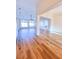 Spacious open-concept living area showcasing new flooring and abundant natural light at 8616 Willow Cabin St, Las Vegas, NV 89131